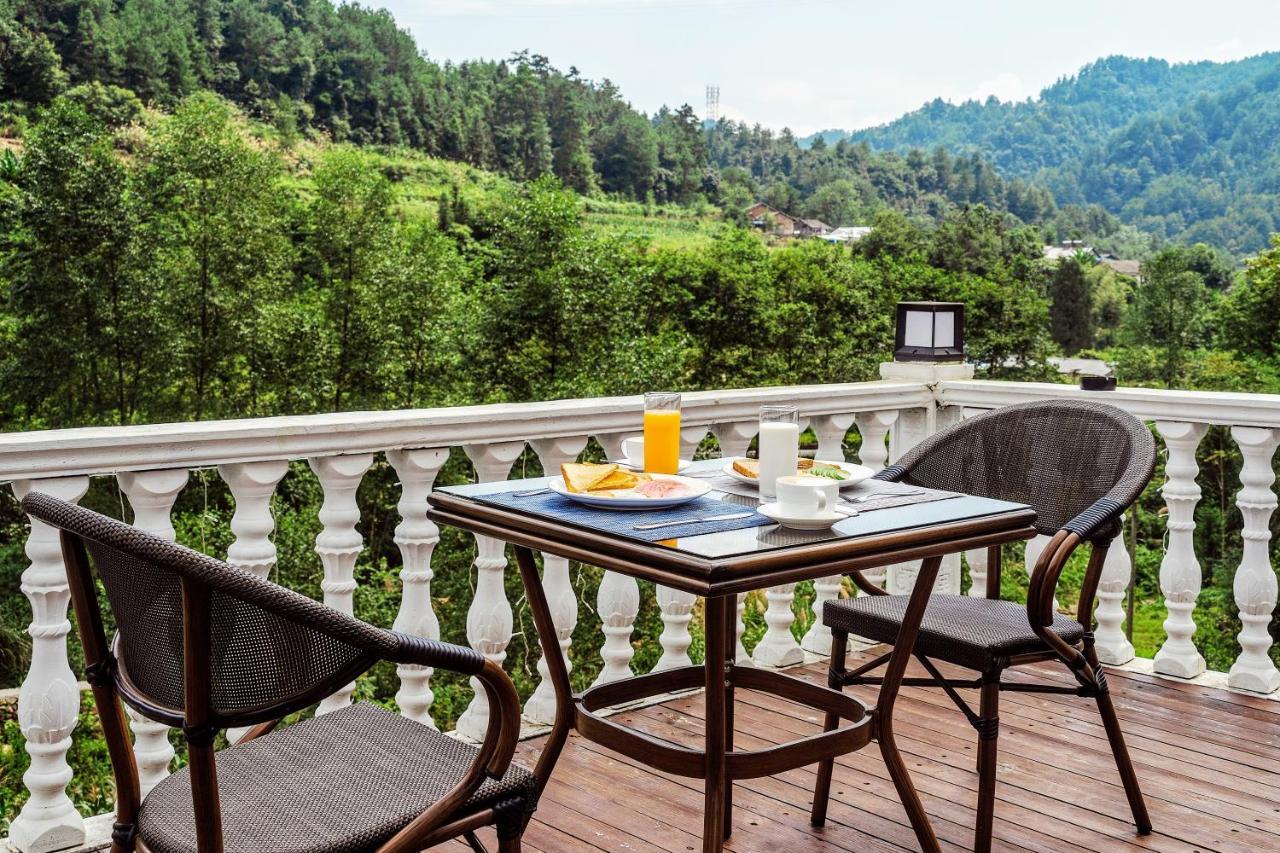 زانغجياجي Whispering Mountains Boutique Hotel المظهر الخارجي الصورة