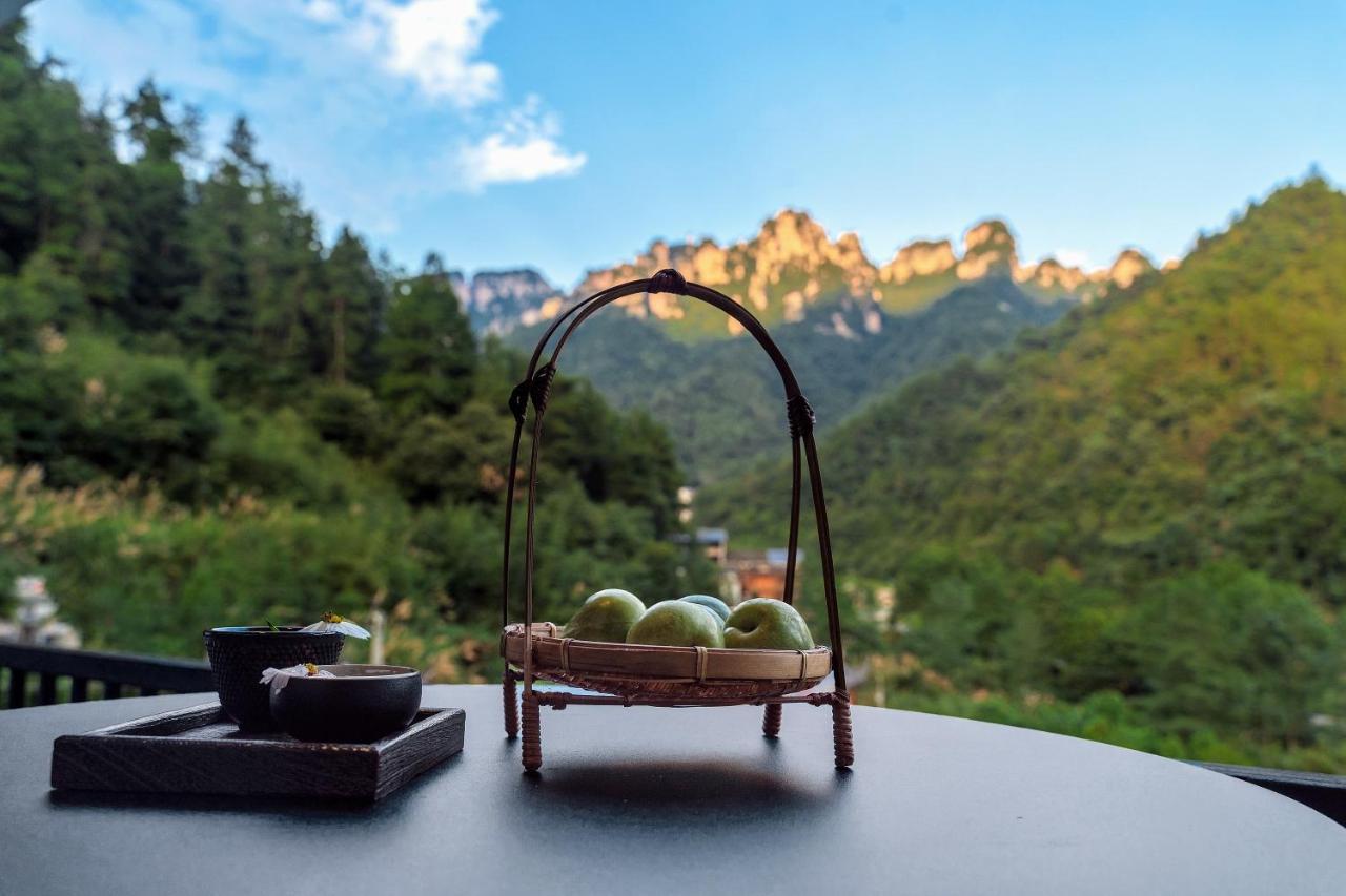 زانغجياجي Whispering Mountains Boutique Hotel المظهر الخارجي الصورة