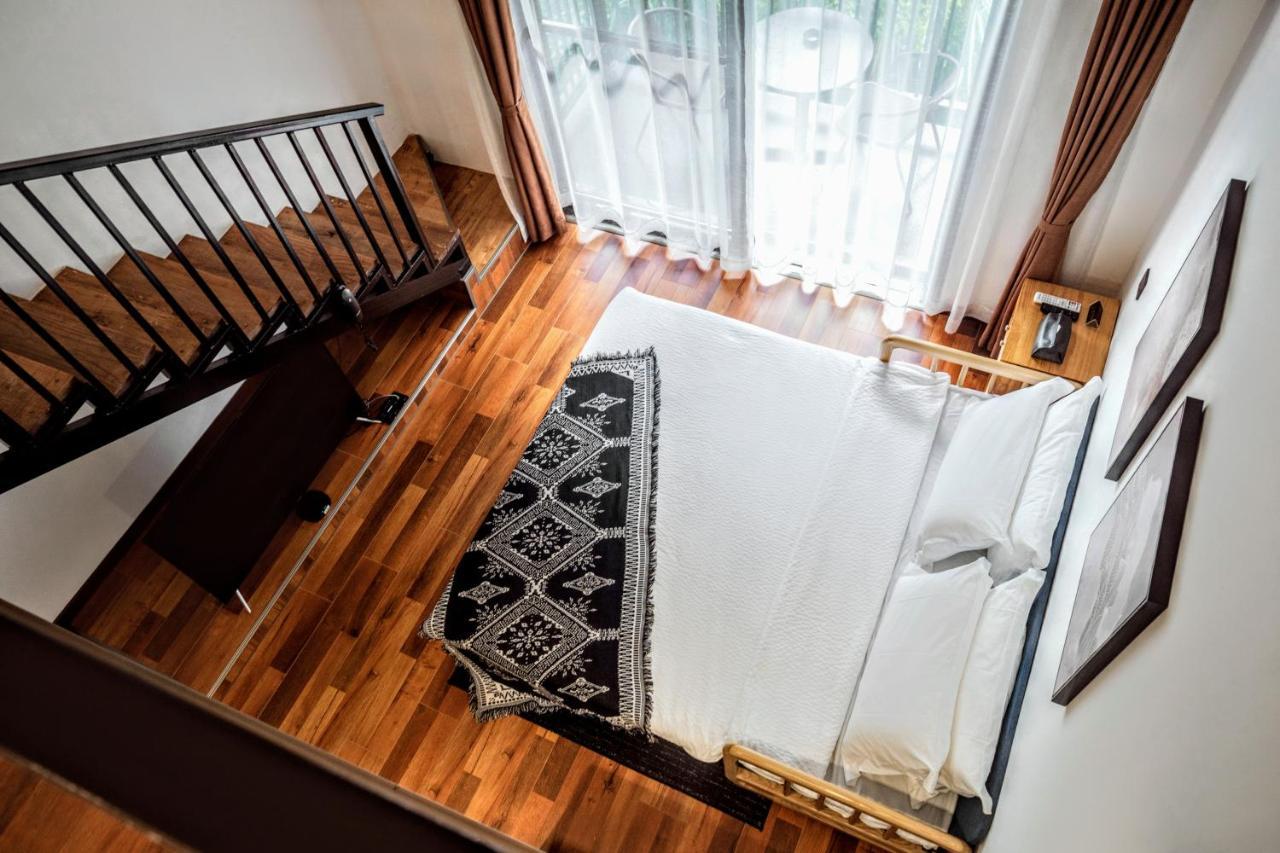 زانغجياجي Whispering Mountains Boutique Hotel المظهر الخارجي الصورة