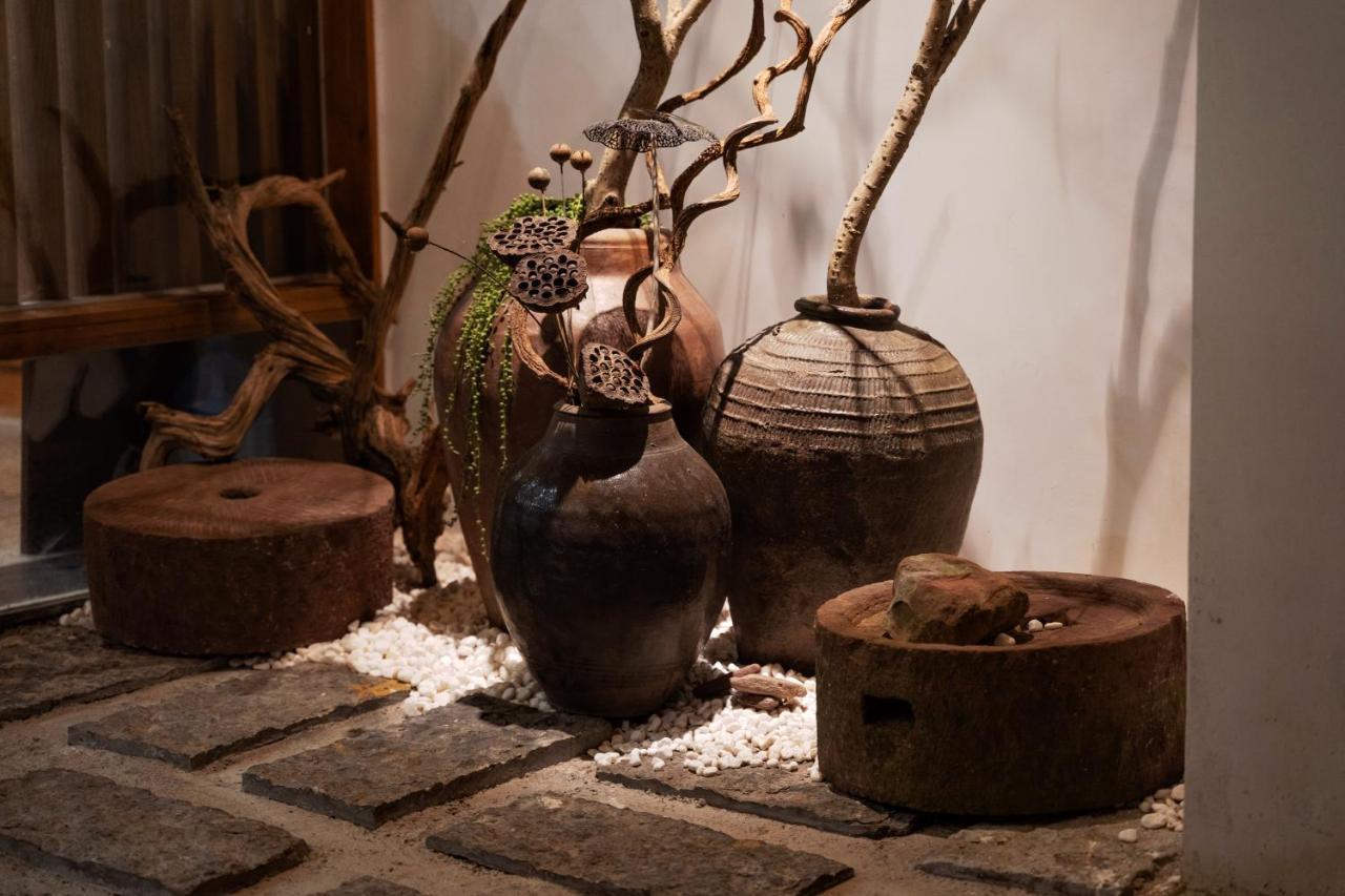 زانغجياجي Whispering Mountains Boutique Hotel المظهر الخارجي الصورة