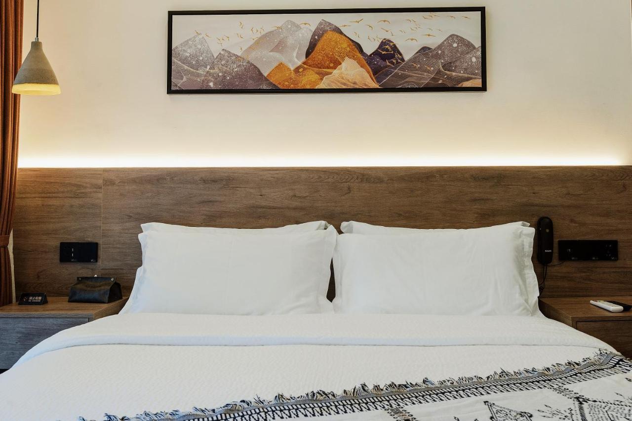 زانغجياجي Whispering Mountains Boutique Hotel المظهر الخارجي الصورة