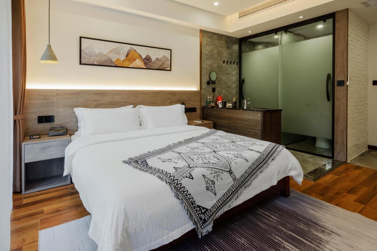زانغجياجي Whispering Mountains Boutique Hotel المظهر الخارجي الصورة