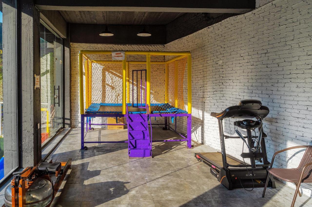 زانغجياجي Whispering Mountains Boutique Hotel المظهر الخارجي الصورة