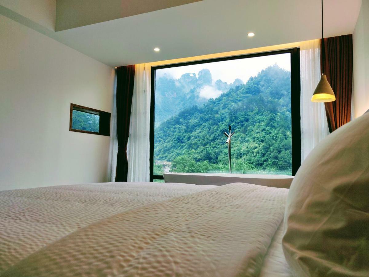 زانغجياجي Whispering Mountains Boutique Hotel المظهر الخارجي الصورة