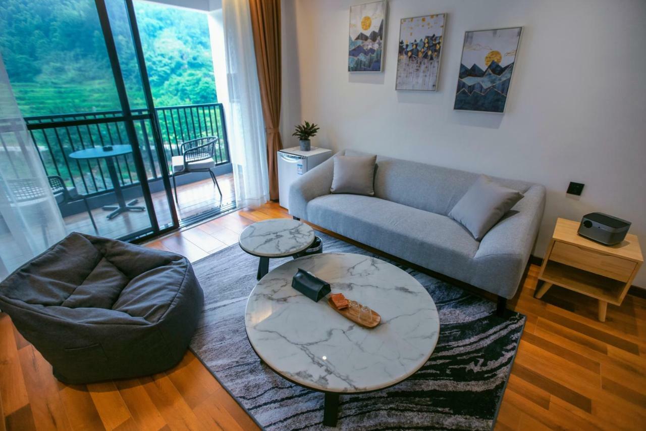 زانغجياجي Whispering Mountains Boutique Hotel المظهر الخارجي الصورة