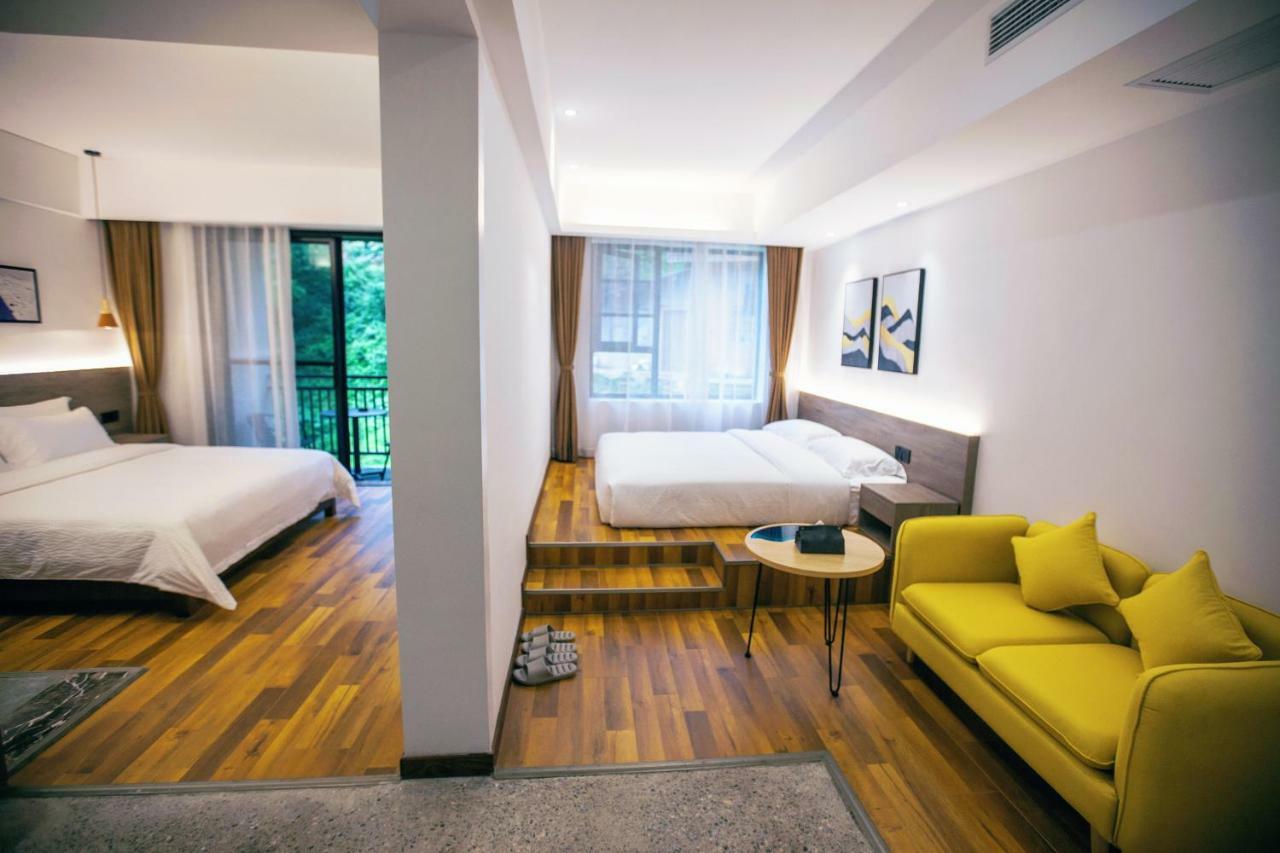 زانغجياجي Whispering Mountains Boutique Hotel المظهر الخارجي الصورة
