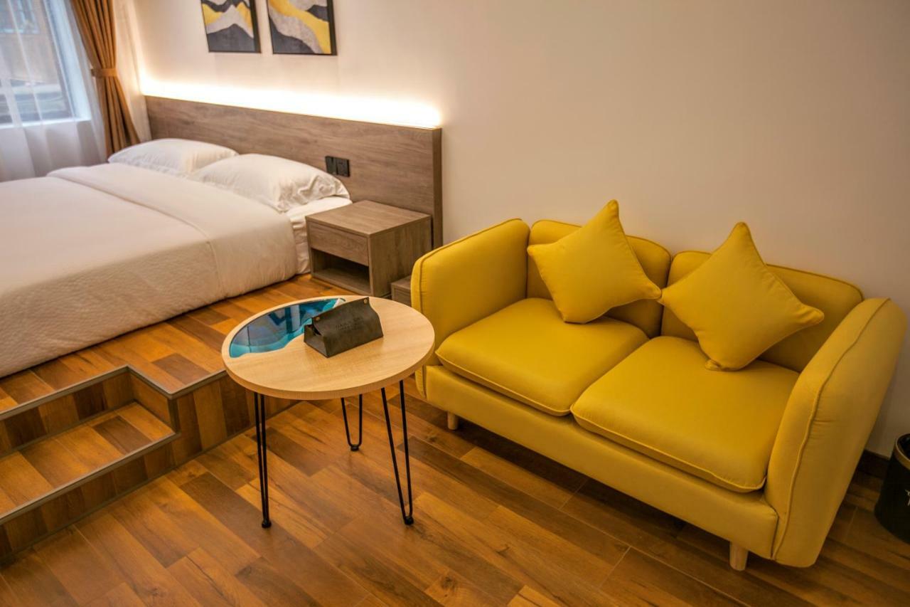 زانغجياجي Whispering Mountains Boutique Hotel المظهر الخارجي الصورة