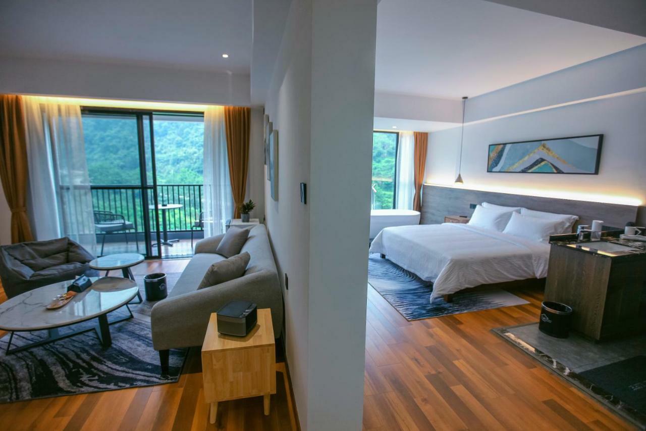 زانغجياجي Whispering Mountains Boutique Hotel المظهر الخارجي الصورة