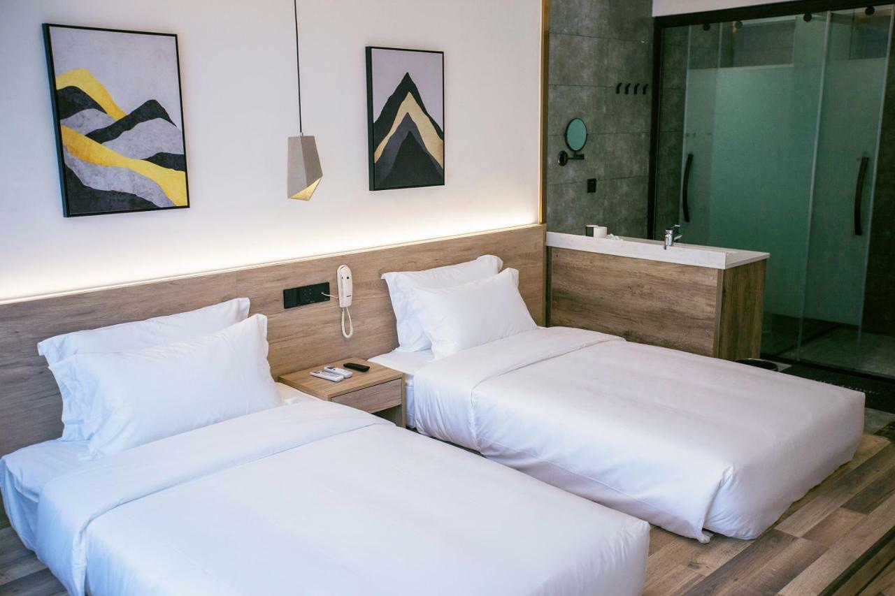 زانغجياجي Whispering Mountains Boutique Hotel المظهر الخارجي الصورة