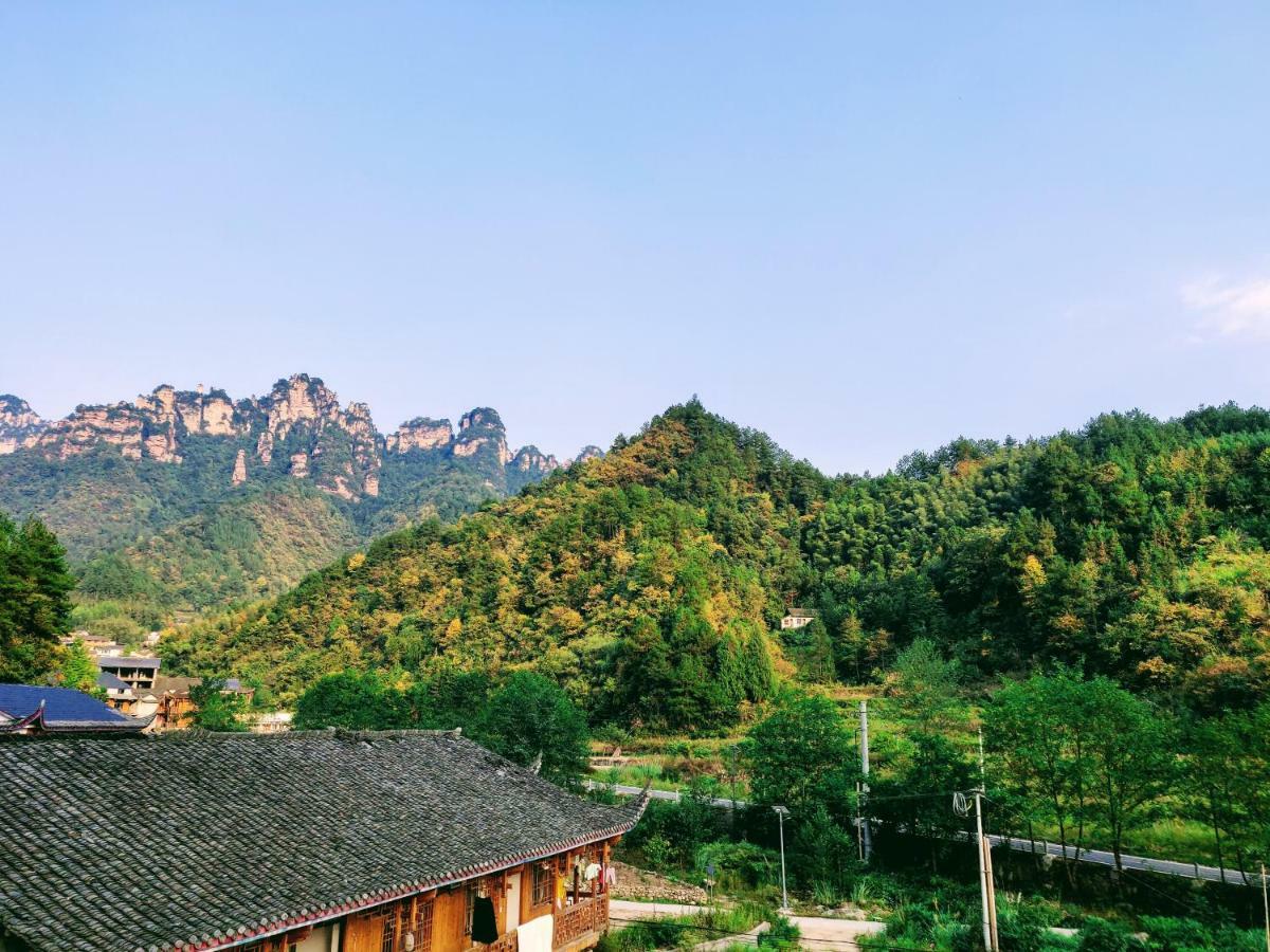 زانغجياجي Whispering Mountains Boutique Hotel المظهر الخارجي الصورة