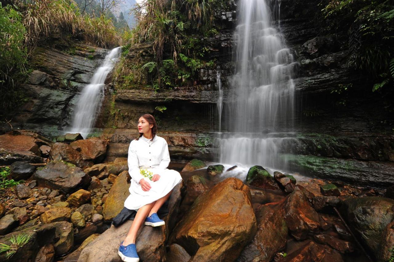 زانغجياجي Whispering Mountains Boutique Hotel المظهر الخارجي الصورة