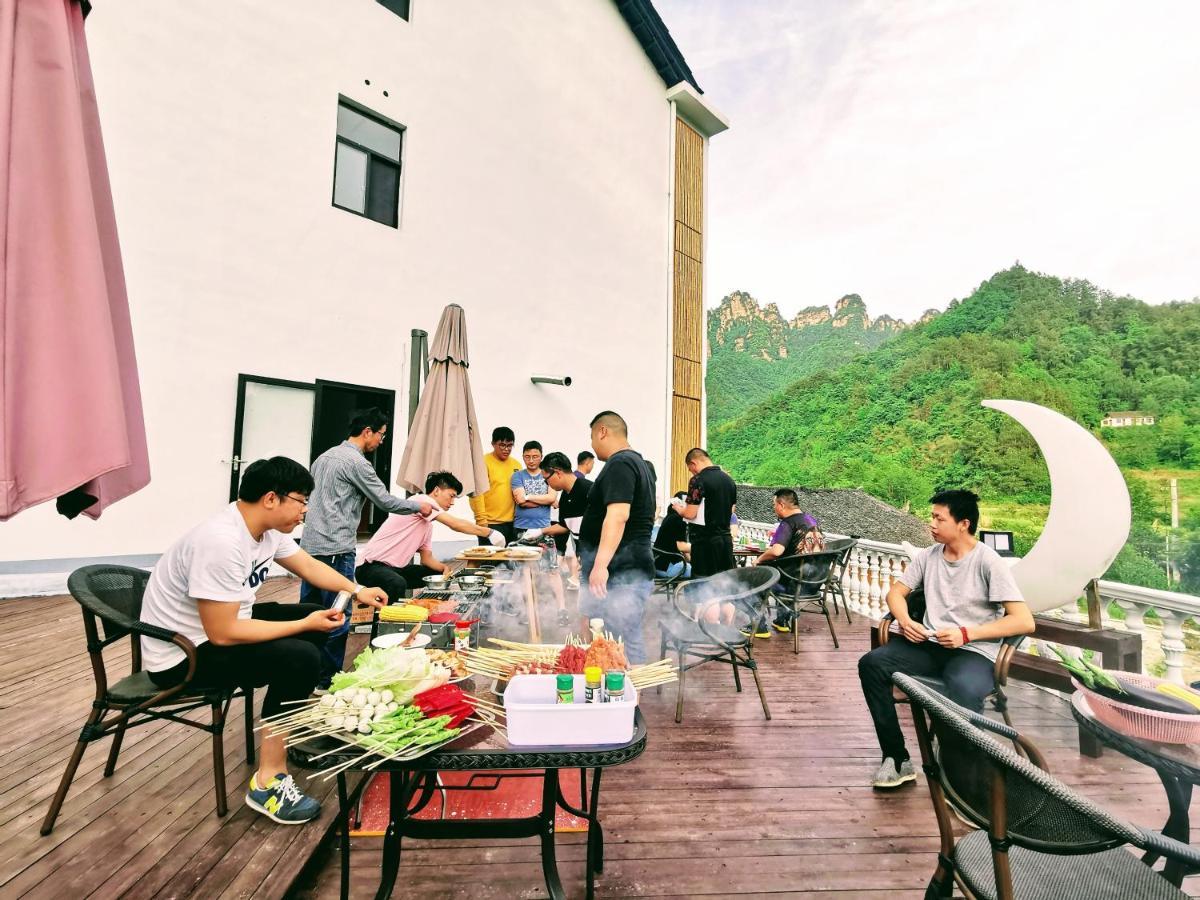 زانغجياجي Whispering Mountains Boutique Hotel المظهر الخارجي الصورة