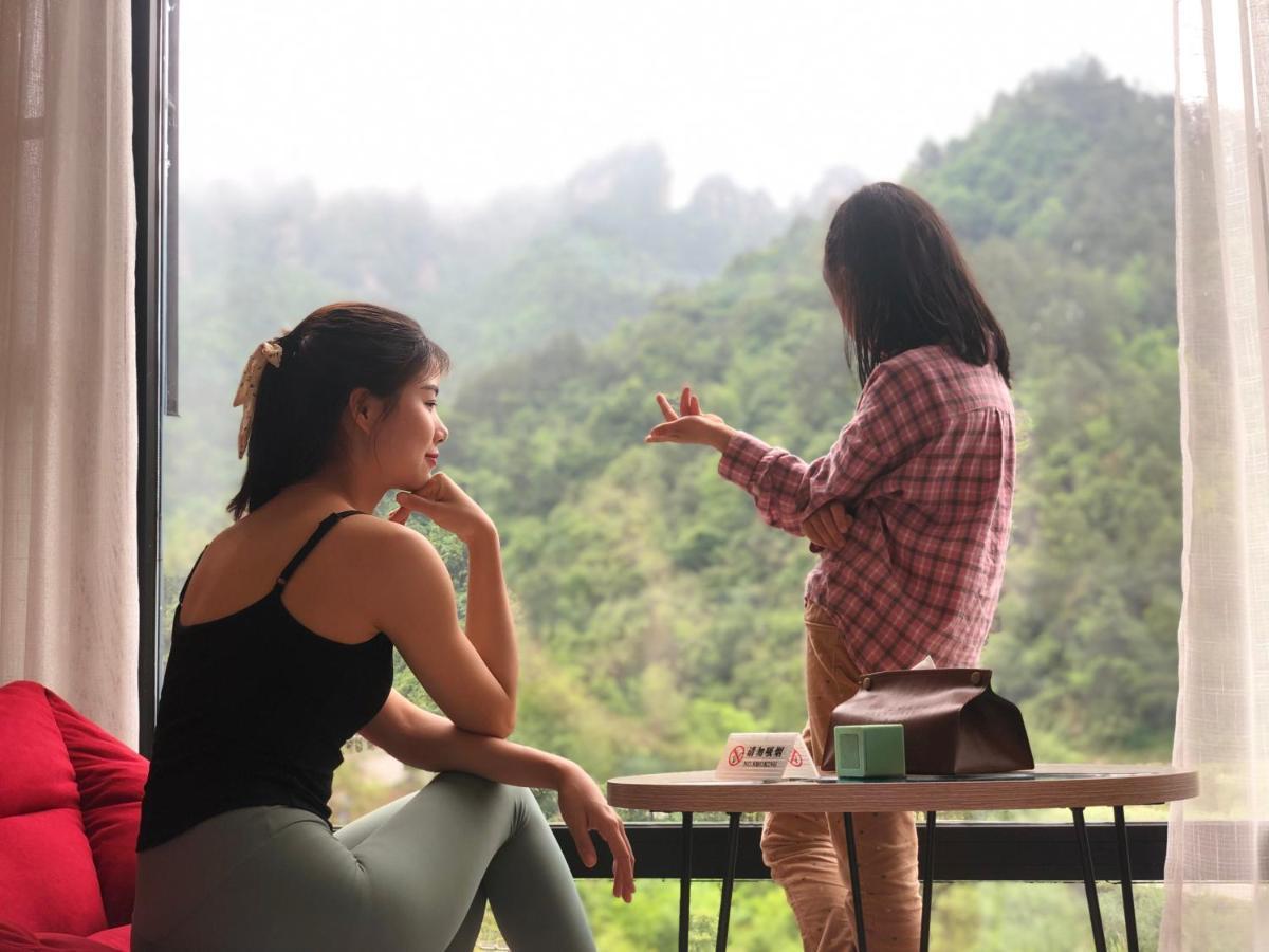 زانغجياجي Whispering Mountains Boutique Hotel المظهر الخارجي الصورة